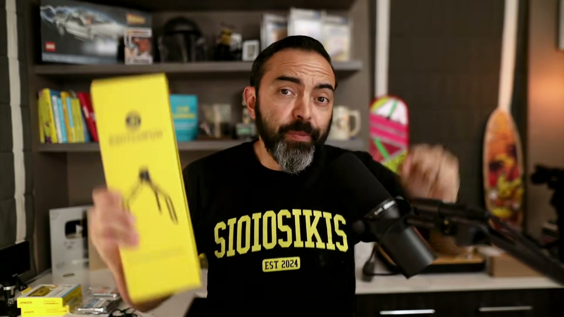 Holding up a competitor product: why packaging and shelf presence matter in physical product launches.