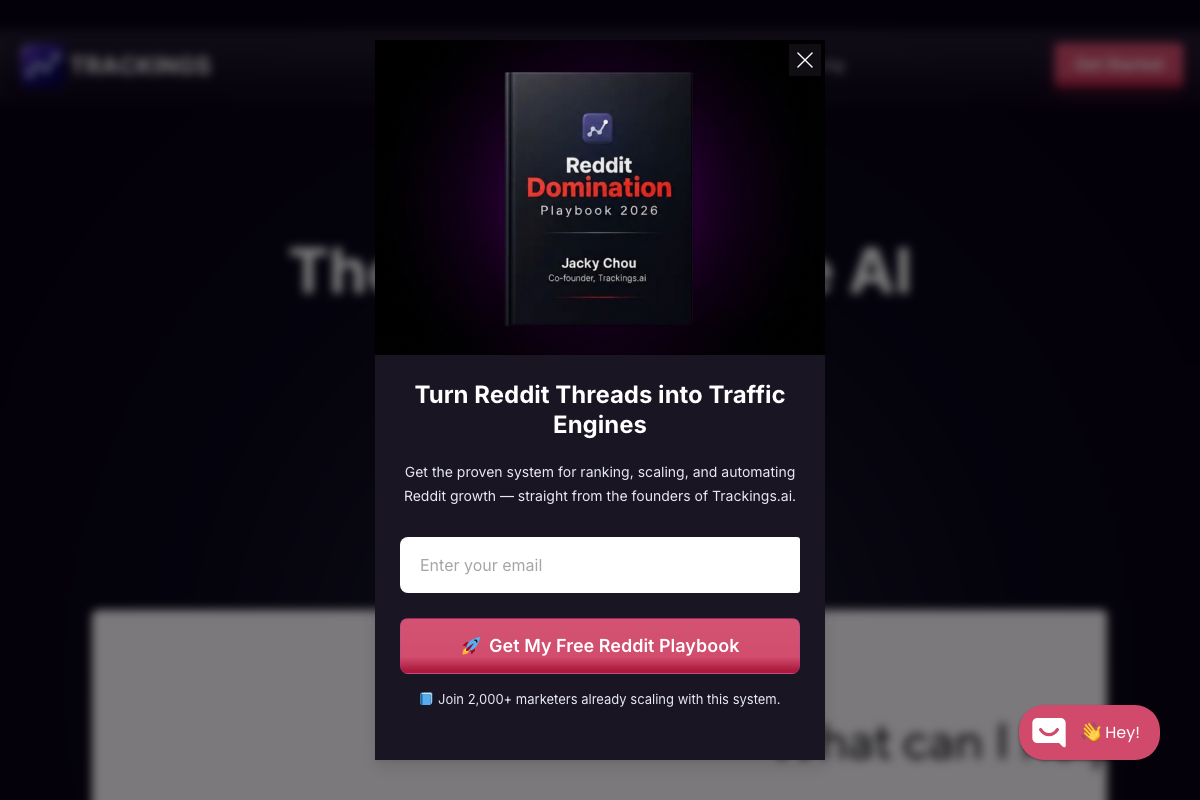 Trackings.ai lead magnet popup — 'Reddit Domination Playbook 2026' by Jacky Chou with email capture CTA, demonstrating the funnel strategy described in Step 7.