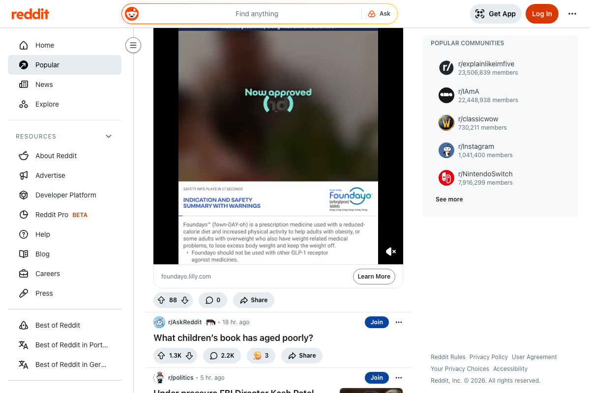 Reddit Popular feed (April 2026) showing a labeled promoted post alongside organic r/AskReddit content — same card format, clearly differentiated by the 