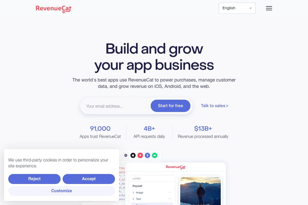 RevenueCat homepage: 91,000 apps, 4B+ daily API requests, $13B+ revenue processed, with paywall builder UI preview