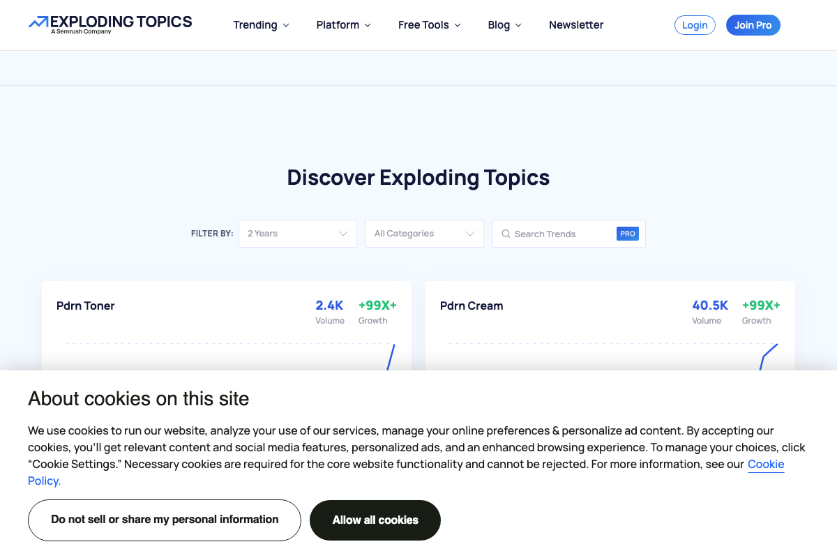 Exploding Topics trend browser showing volume and growth-multiplier metrics per topic, with keyword search requiring a Pro subscription.