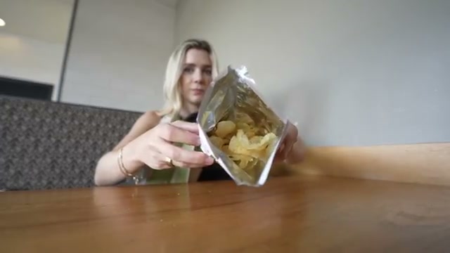 An almost-empty chip bag perfectly illustrates shrinkflation: same price, dramatically less product